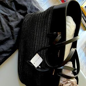 Saint Laurent leather and straw 2021 bag.